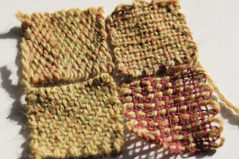 4 small greenish orange wool squares with different textures